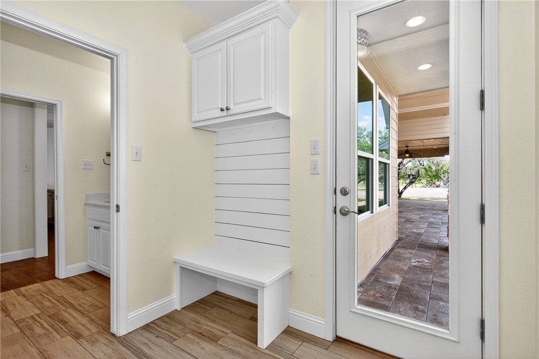 5332 Alegre Lane Robstown, TX 78380 - Photo 38 of 40 a view of a hallway with wooden floor and entryway