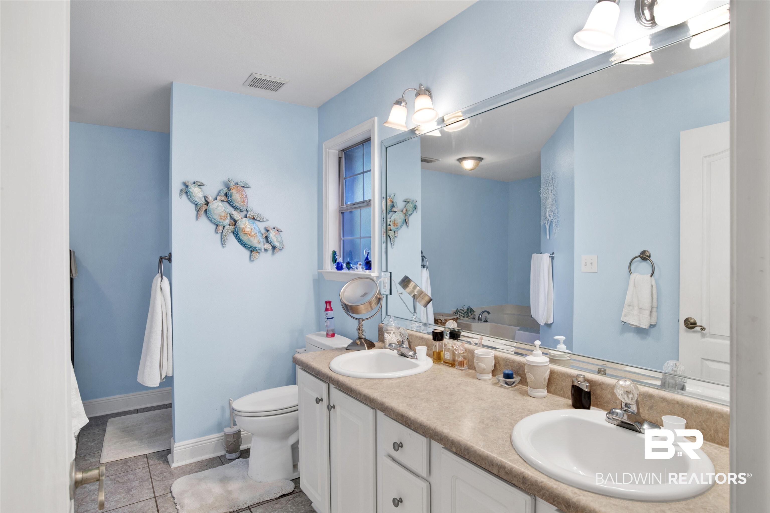 314 Blackfriars Street Fairhope, AL 36532 - Photo 18 of 25 Bathroom with vanity, tile patterned floors, and toilet