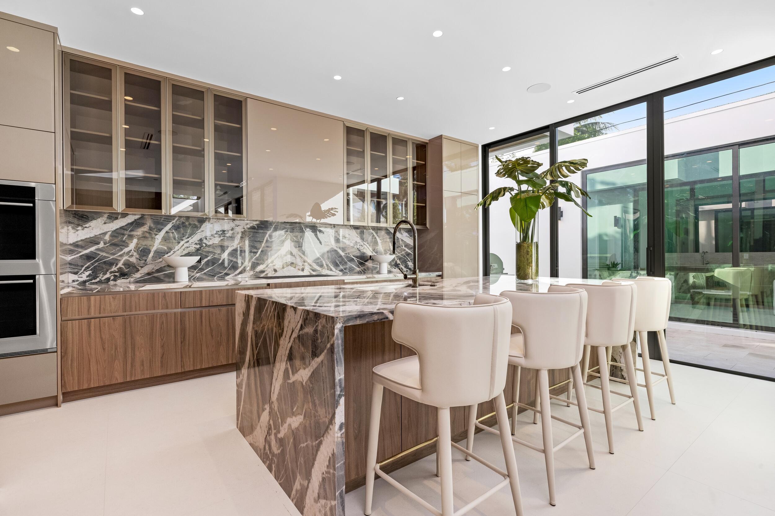 1099 Northeast 4th Avenue Boca Raton, FL 33432 - Photo 13 of 60 a view of a dining room with furniture window and outside view