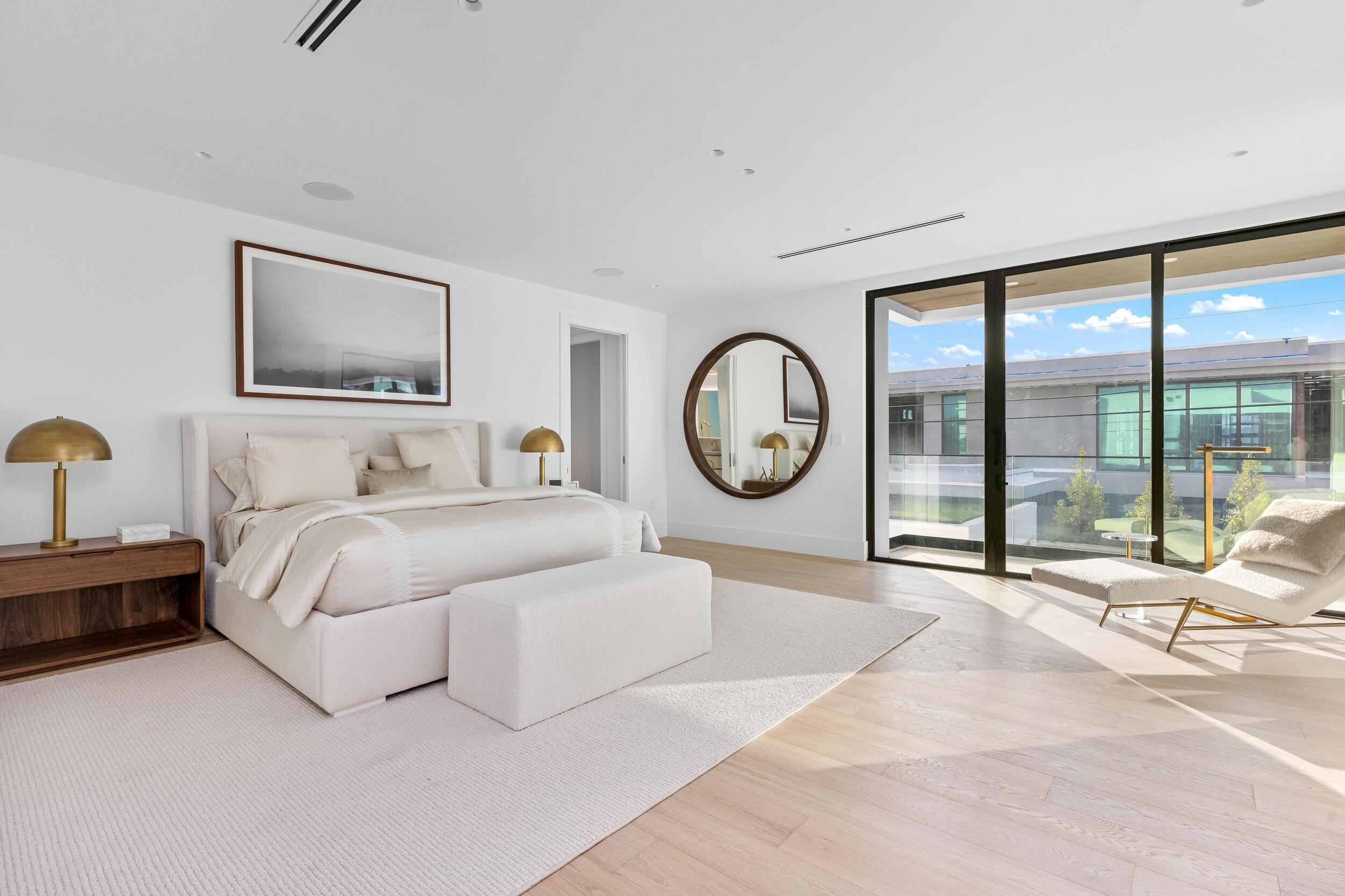 1099 Northeast 4th Avenue Boca Raton, FL 33432 - Photo 28 of 60 a bedroom with a large bed and large window