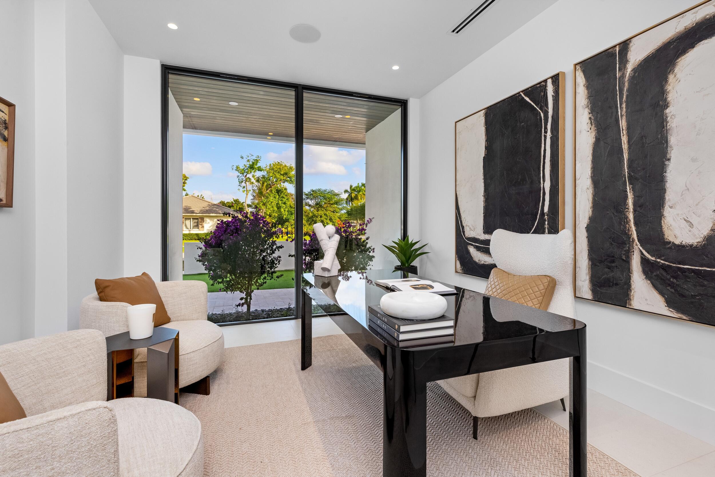 1099 Northeast 4th Avenue Boca Raton, FL 33432 - Photo 38 of 60 a living room with furniture potted plant and a large window