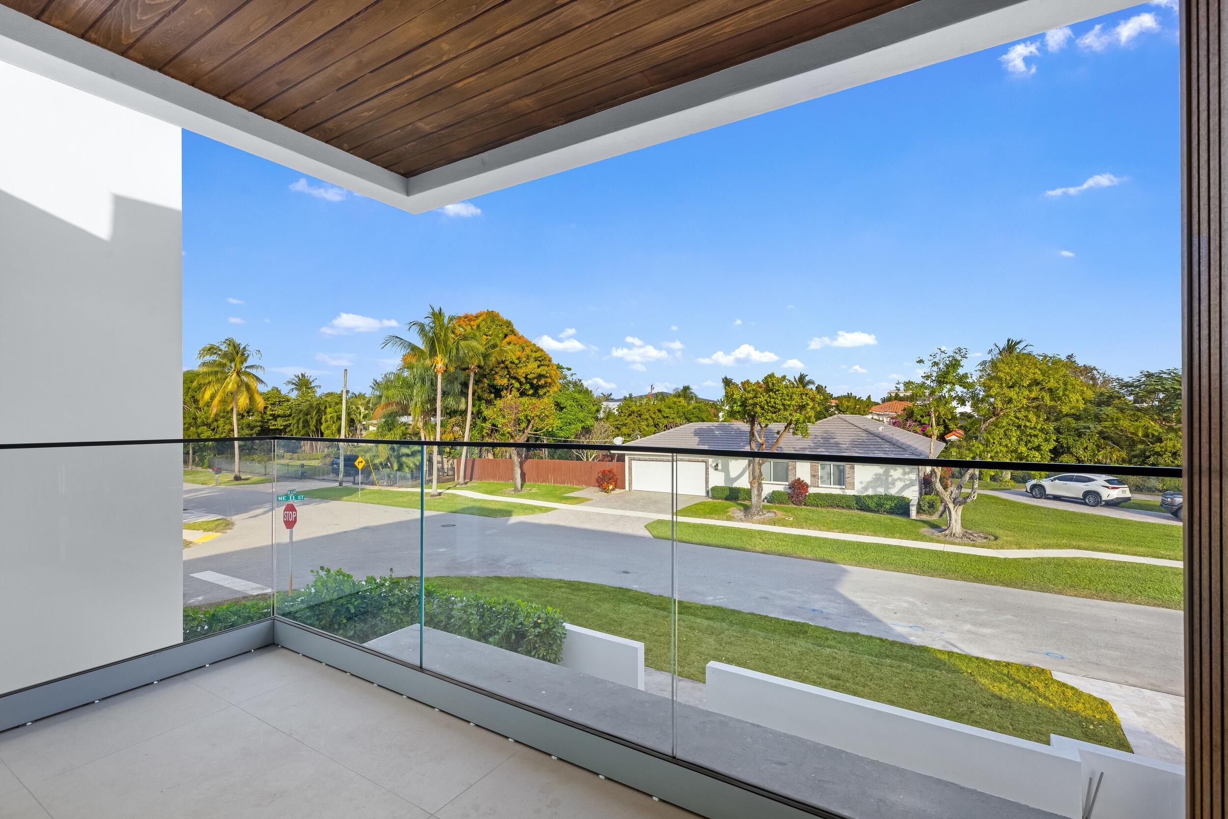 1099 Northeast 4th Avenue Boca Raton, FL 33432 - Photo 40 of 60 a view of swimming pool with a lawn chairs