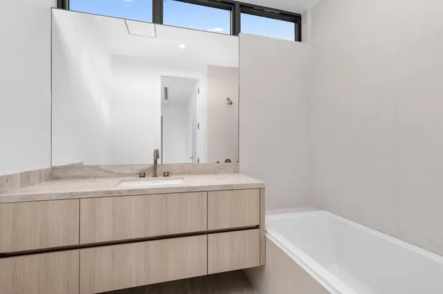 a outdoor space with lots of furniture and glass door