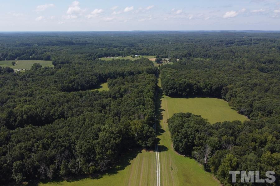 1 Roxboro Road Rougemont, NC 27572 - Photo 19 of 35 an aerial view of a house with a yard and lake view