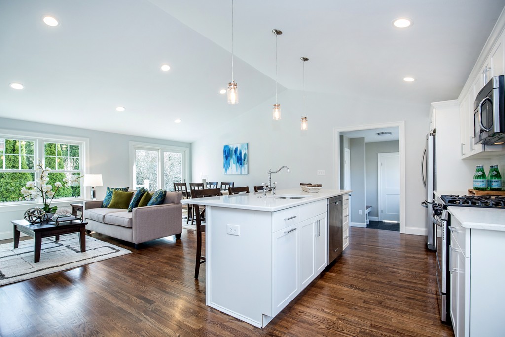 85 Cornell Road Marblehead, MA 01945 - Photo 8 of 29 a large kitchen with stainless steel appliances a large center island and a stove