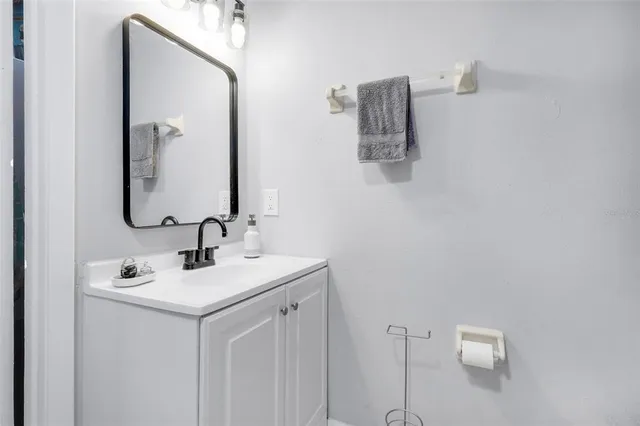 a view of a livingroom with furniture and a flat screen tv