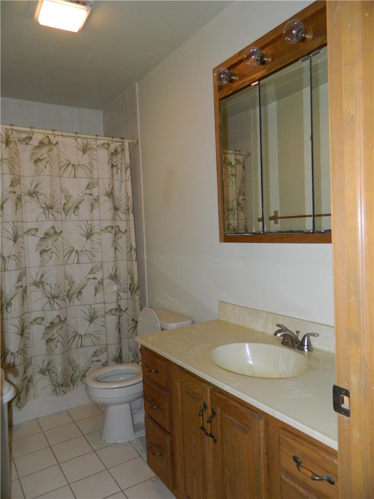 328 Pin Oak Road Stroudsburg, PA 18360 - Photo 29 of 37 Functional bathroom features a classic vanity with ample storage, serving everyday needs.