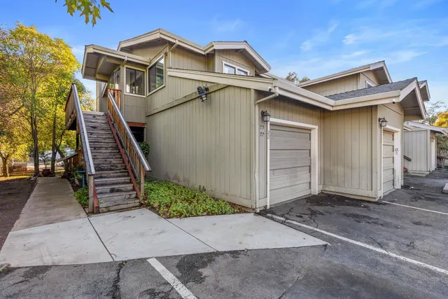 a view of a house with a street