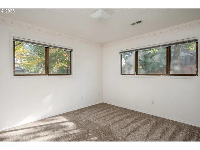 a bathroom with a sink a toilet and vanity