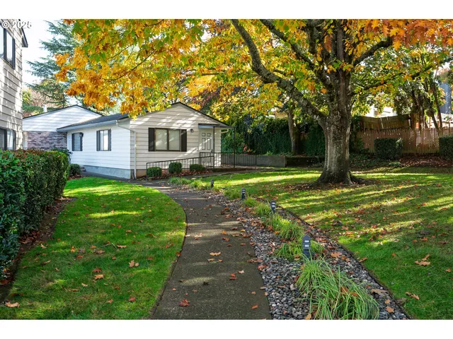 a view of a house with swimming pool