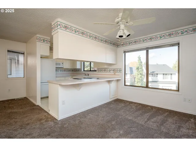 a bathroom with a sink a mirror and a window