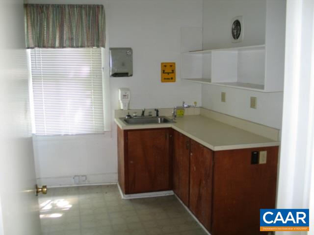 22 Shiloh Road, Unit 2 Stanardsville, VA 22973 - Photo 14 of 22 a bathroom with a sink and a shower