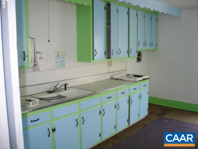 22 Shiloh Road, Unit 2 Stanardsville, VA 22973 - Photo 20 of 22 a bathroom with a sink and a mirror