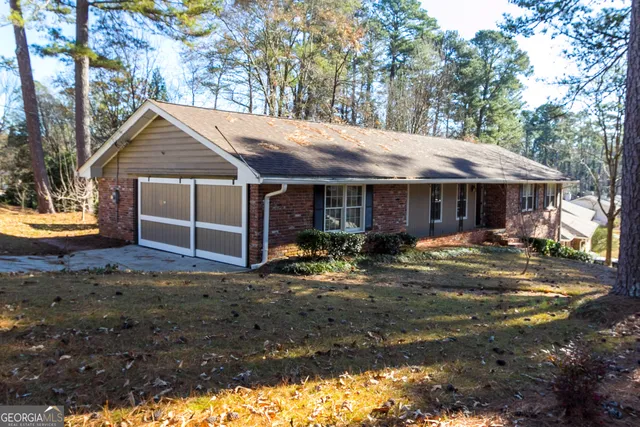 a front view of a house with sitting space