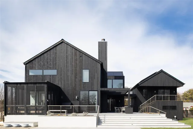 a front view of a house with parking