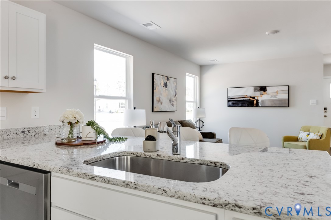 101 Our Way Drive Kilmarnock, VA 22482 - Photo 20 of 38 a kitchen with a sink and a window