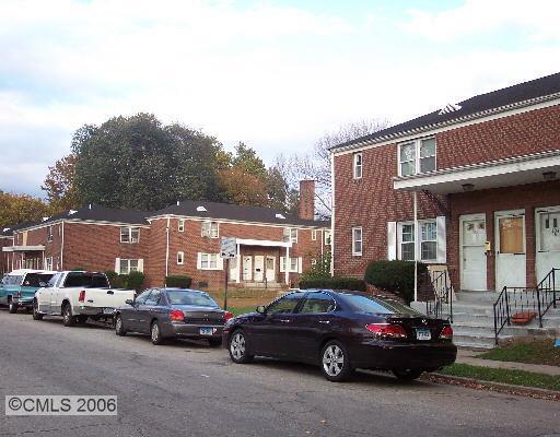 104 Chestnut Street, Unit A Bridgeport, CT 06604 - Photo 1 of 1 a view of a car parked in front of a building