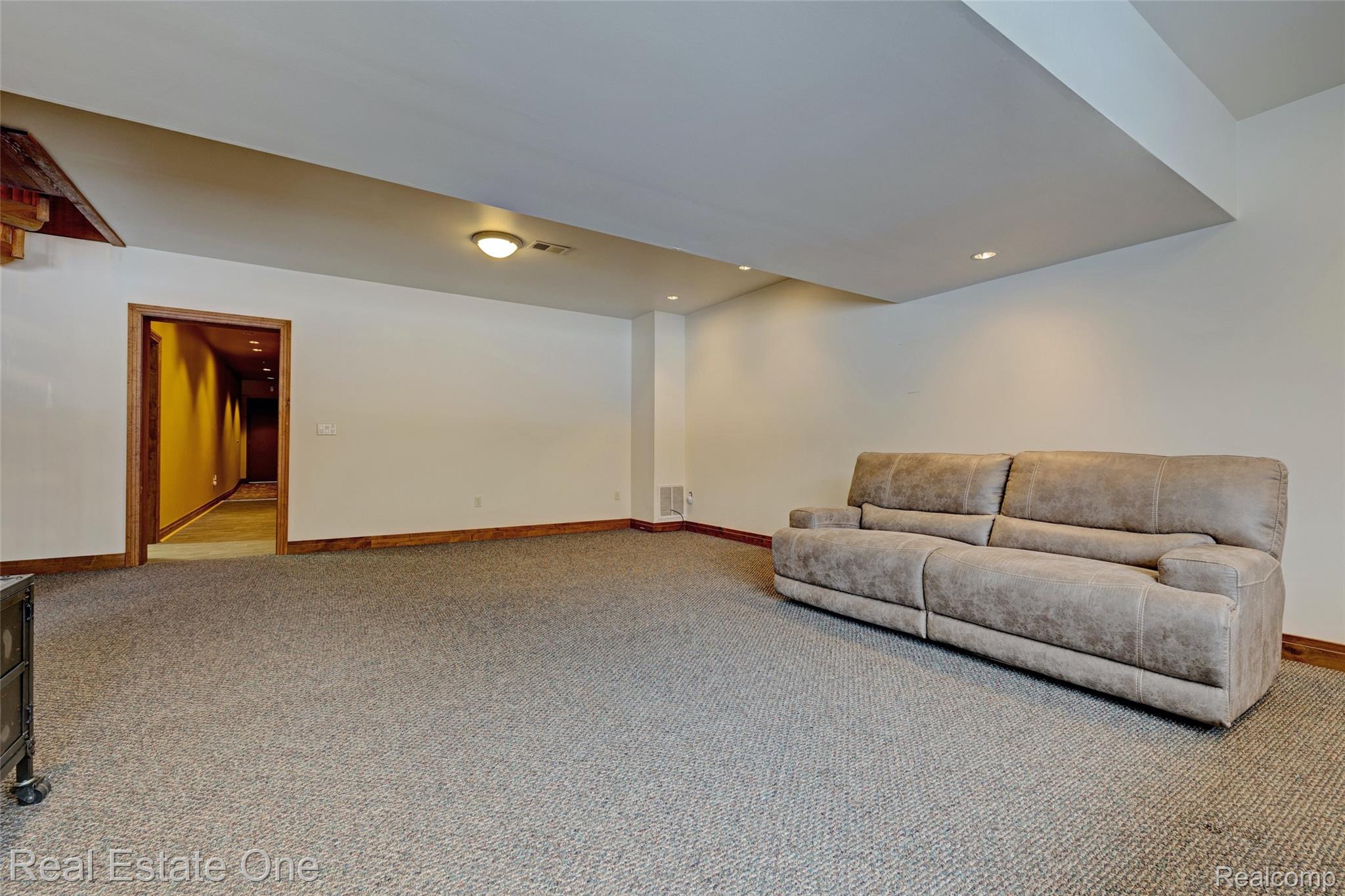 4340 Lahring Road Holly, MI 48442 - Photo 47 of 89 Living room with light colored carpet and recessed lighting