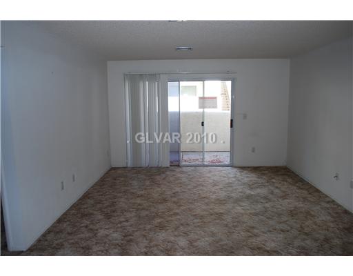 7100 West Pirates Cove Road, Unit 1126 Las Vegas, NV 89145 - Photo 3 of 10 Living Room.