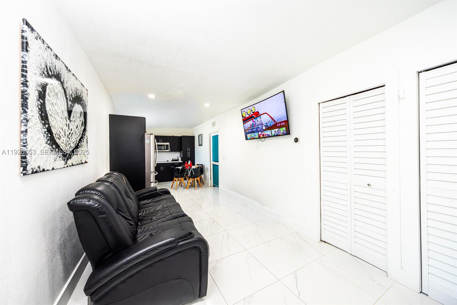 9365 Southwest 44th Street Miami, FL 33165 - Photo 16 of 24 a living room with furniture