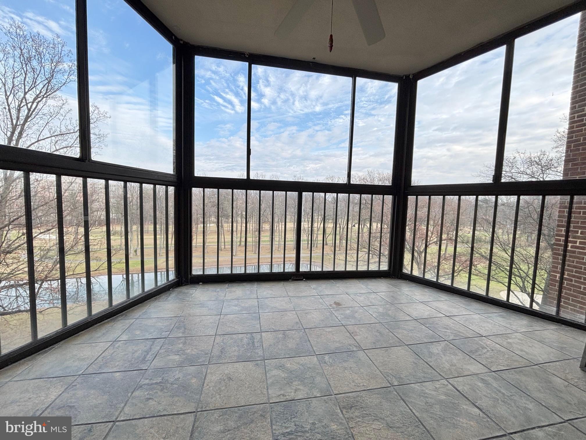15107 Interlachen Drive, Unit 2702 Silver Spring, MD 20906 - Photo 8 of 13 Sunroom