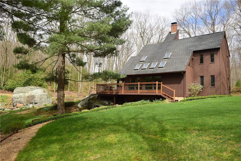 32 Burbank Road Tolland, CT 06084 - Photo 1 of 1 a view of a house with a backyard