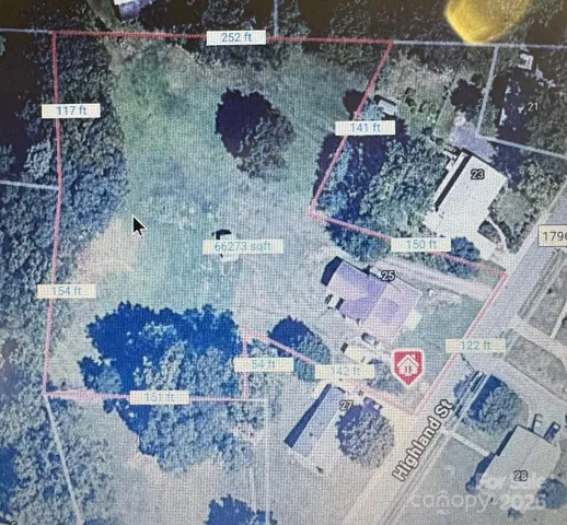 an aerial view of residential house and outdoor space