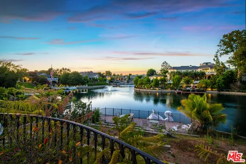 a view of a lake with a city view
