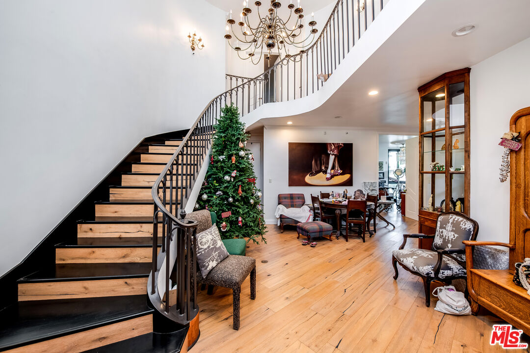 10061 Valley Spring Lane Toluca Lake, CA 91602 - Photo 13 of 37 a living room with furniture and a fireplace
