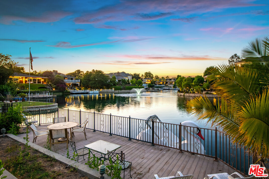 10061 Valley Spring Lane Toluca Lake, CA 91602 - Photo 2 of 37 a lake view with a outdoor space