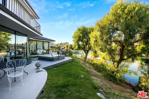 a view of balcony with outdoor seating