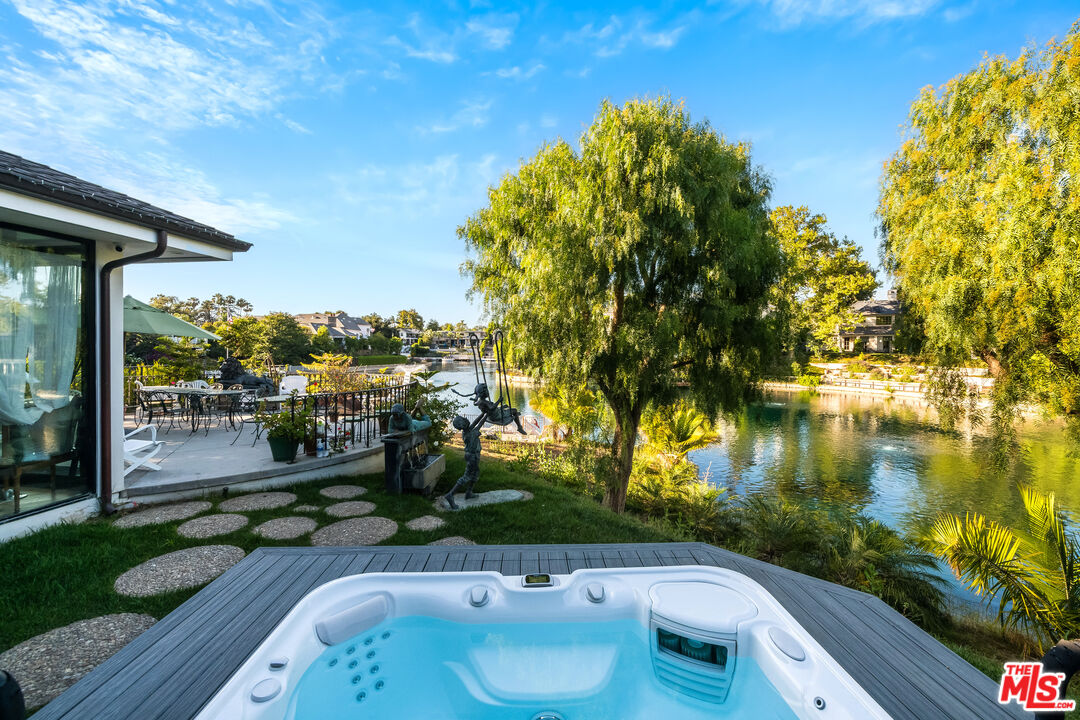 10061 Valley Spring Lane Toluca Lake, CA 91602 - Photo 26 of 37 a view of swimming pool from a balcony