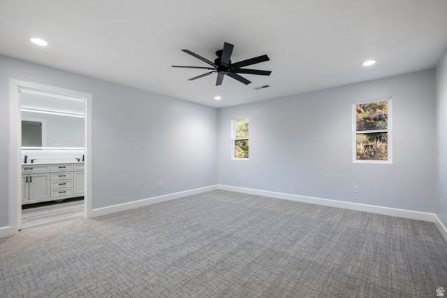 476 Spring Drive Toquerville, UT 84774 - Photo 51 of 95 Carpeted spare room featuring ceiling fan and recessed lighting
