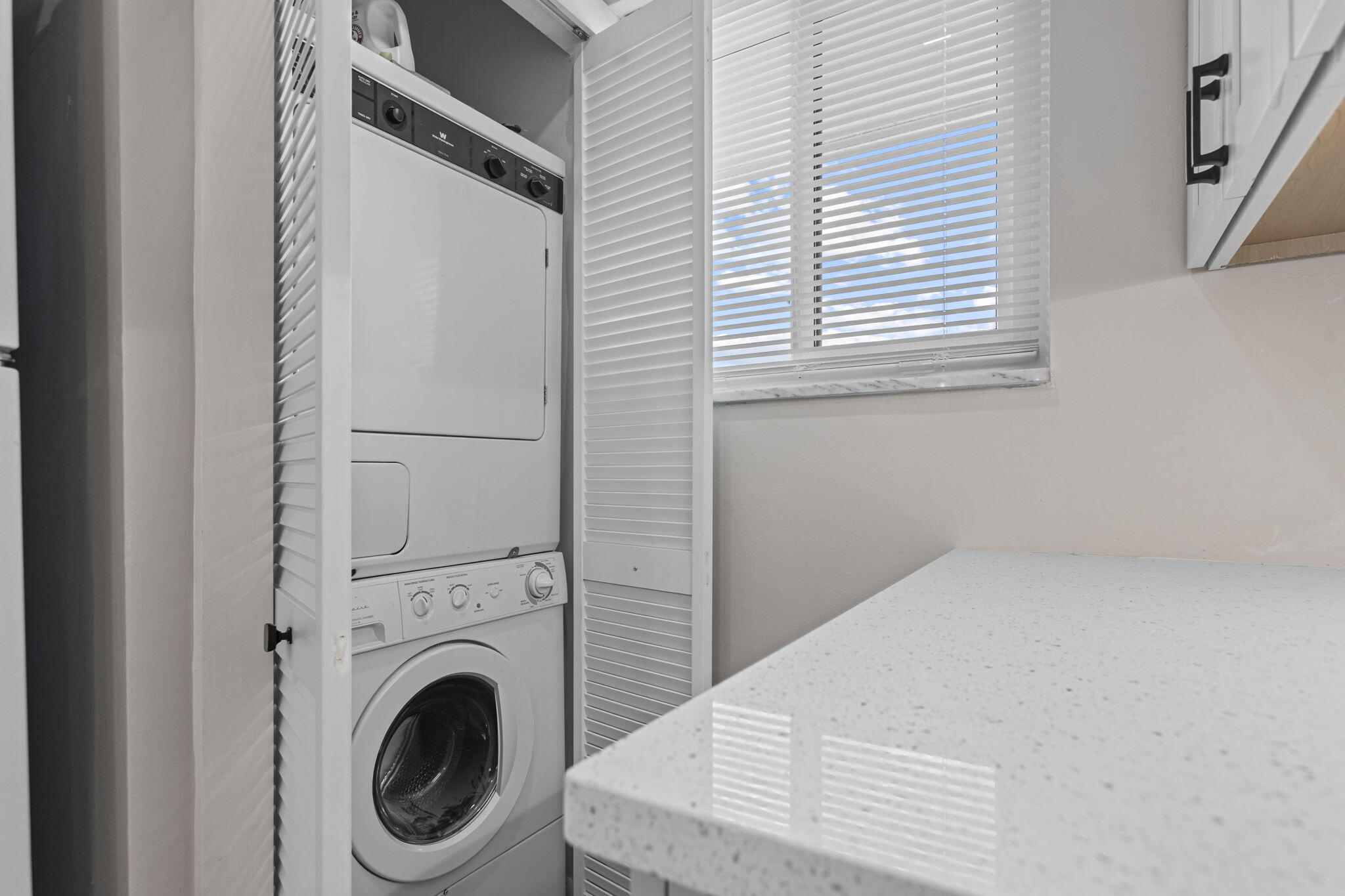 5433 Southeast Miles Grant Road, Unit 201 Stuart, FL 34997 - Photo 5 of 25 16-web-or-mls-0V8A4641Topaz