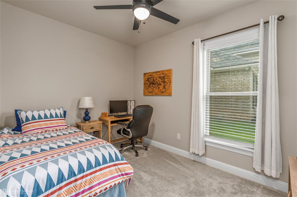 122 Brimestone Loop Benton, LA 71006 - Photo 22 of 33 a bedroom with a bed and a window