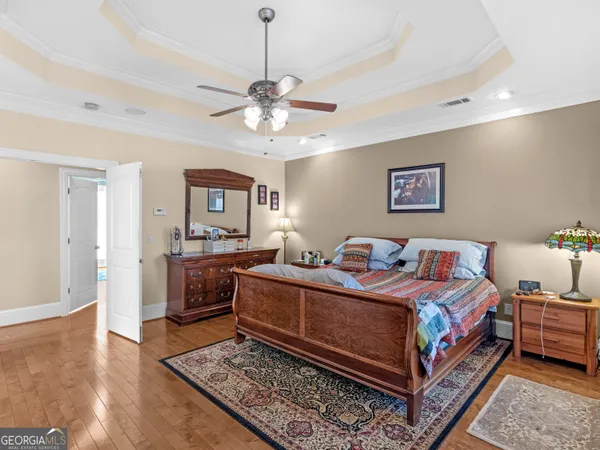 a living room with lots of furniture and a chandelier