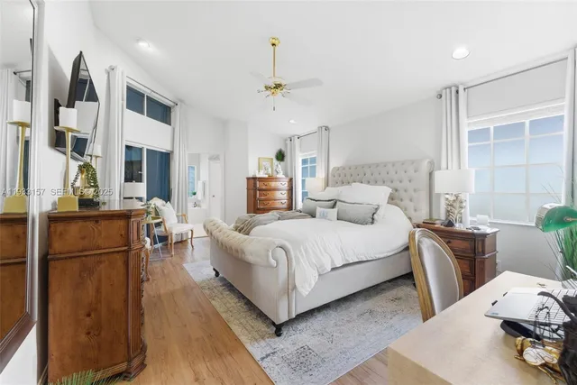 a bed room with a bed and a chair