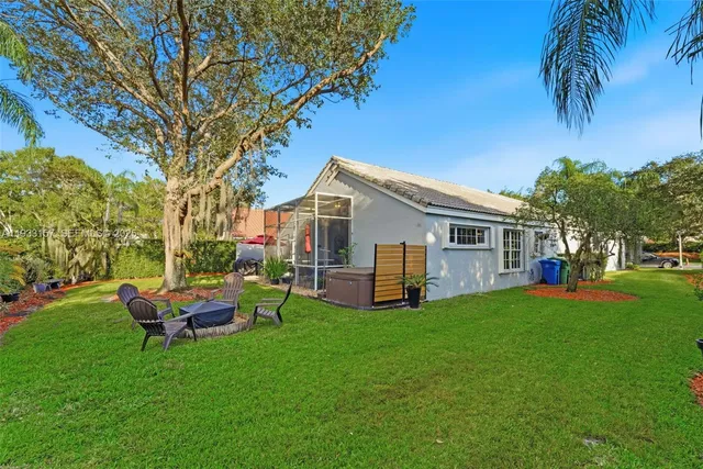 a front view of house with yard and seating area