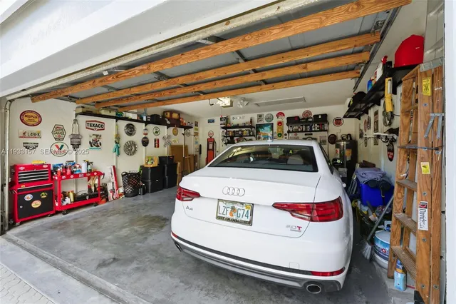 a white car parked in a garage