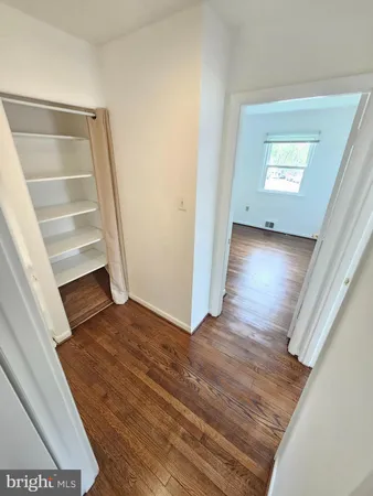 a view of entryway with wooden floor