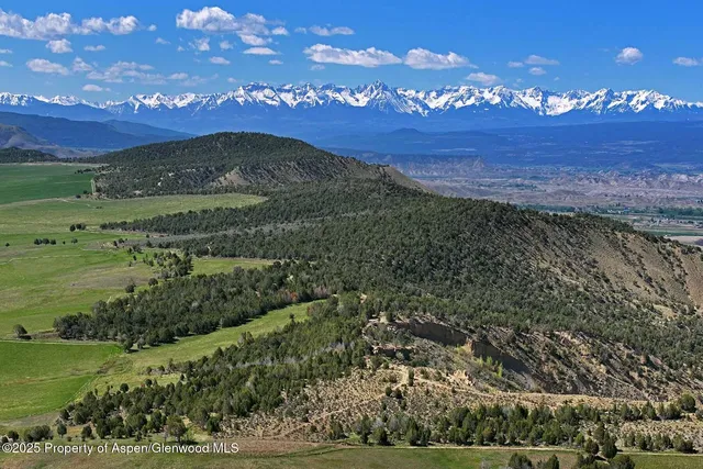 a view of a city with an ocean