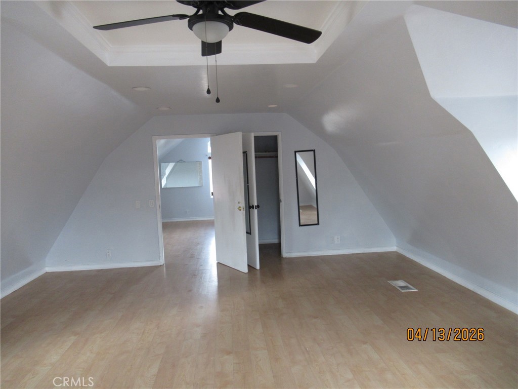 37650 Tripp Flats Road Anza, CA 92539 - Photo 8 of 8 an empty room with a ceiling fan and carpet