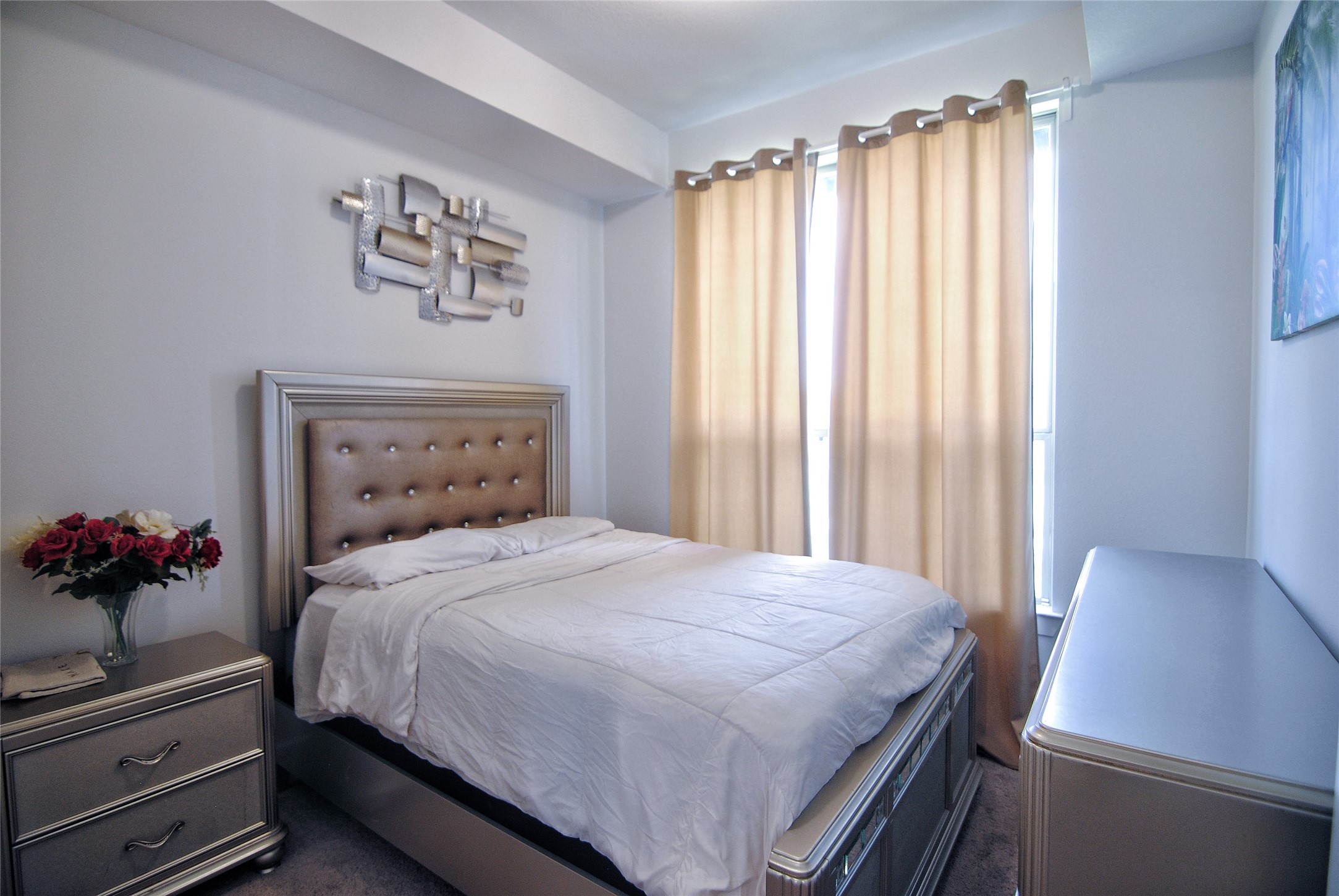 31447 Golden Cliffs Lane Fulshear, TX 77441 - Photo 15 of 45 a bedroom with a bed and a window