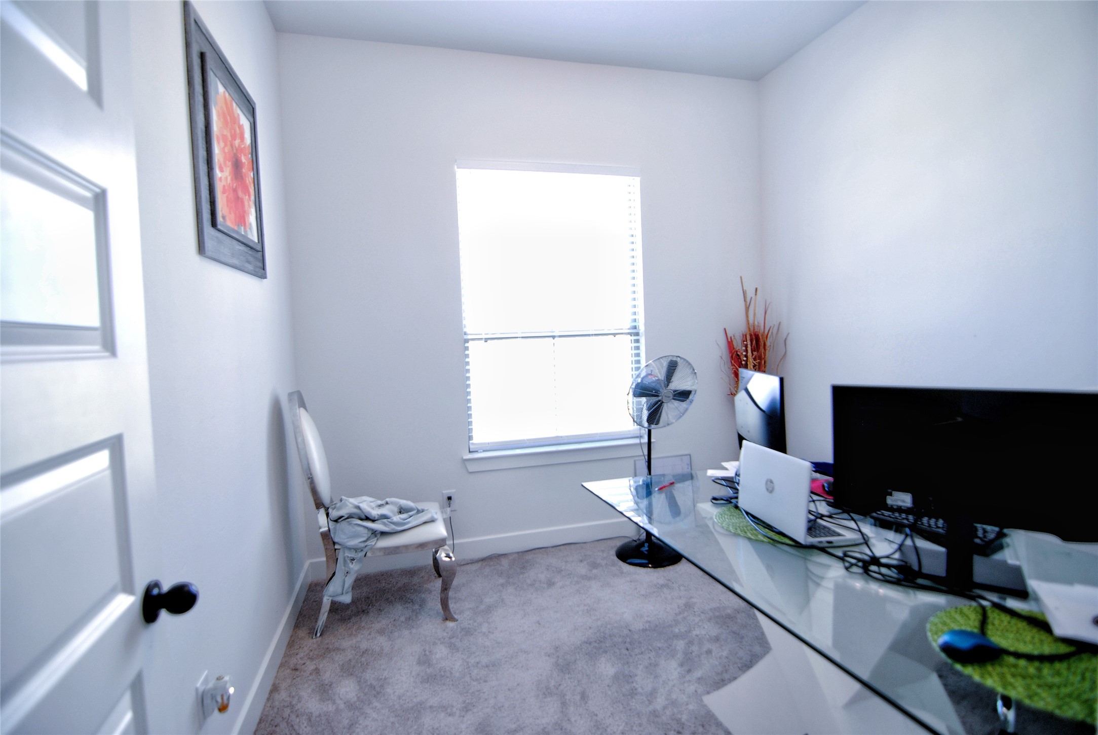 31447 Golden Cliffs Lane Fulshear, TX 77441 - Photo 30 of 45 a living room with furniture and a flat screen tv