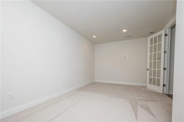 an empty room with a natural light