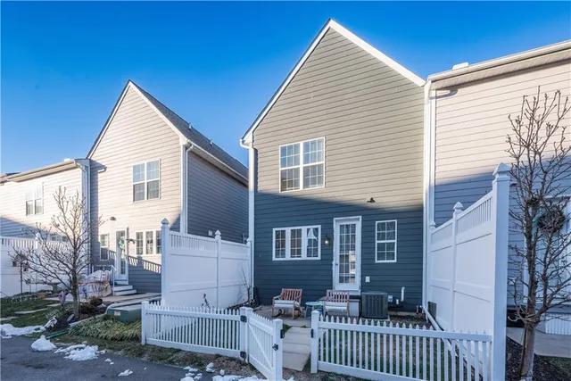 a front view of a building with street view