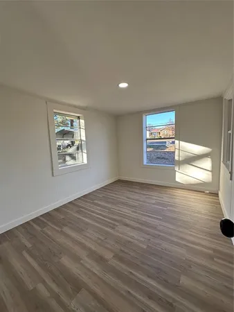 a room with a sink and a mirror