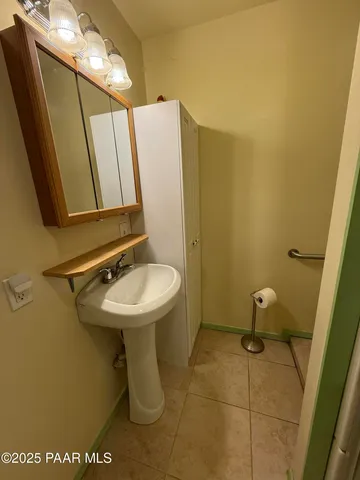 a bathroom with a shower and a toilet