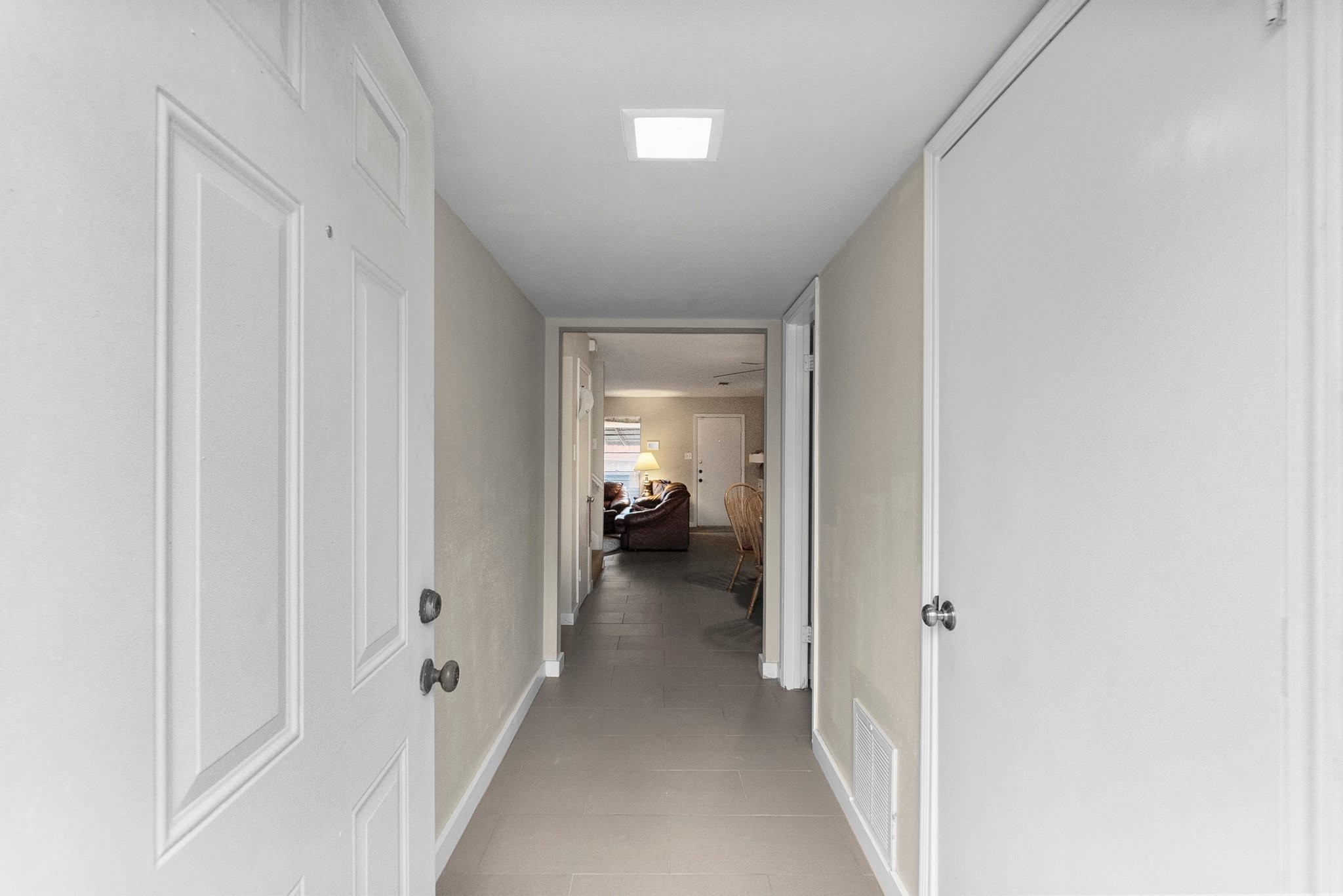 407 West Semands Street Conroe, TX 77301 - Photo 19 of 28 a view of a hallway with a white walls