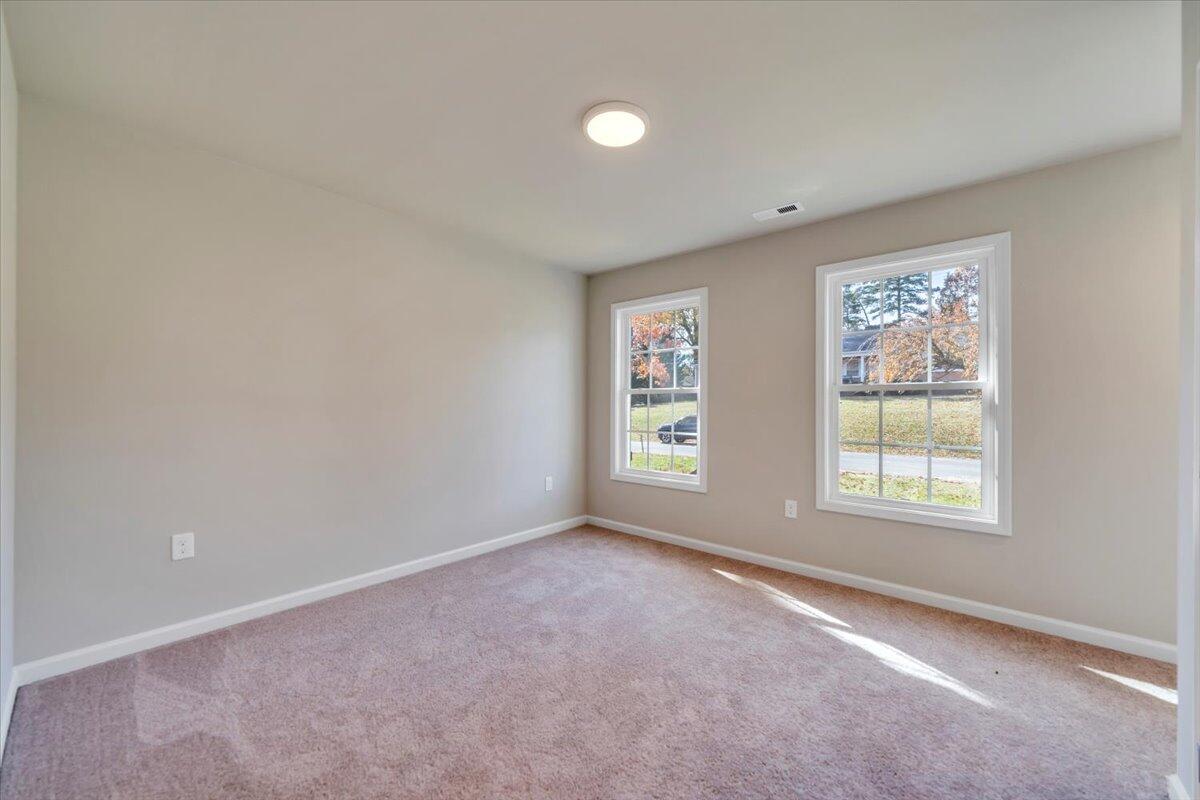 1109 Niagara Road Vinton, VA 24179 - Photo 19 of 25 an empty room with windows